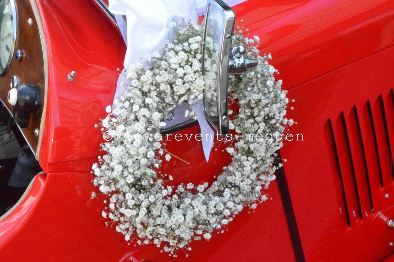 Car decoration with a wreath from baby breath