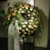 Funeral wreath in salmon and cream colors