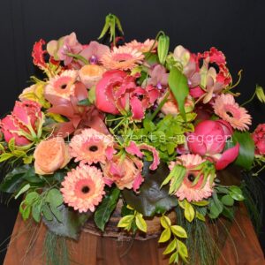 Flower basket in salmon-red colors